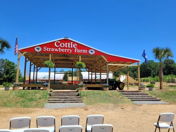 30x40x12 shelter with a 12x40 lean-to, finished red and green