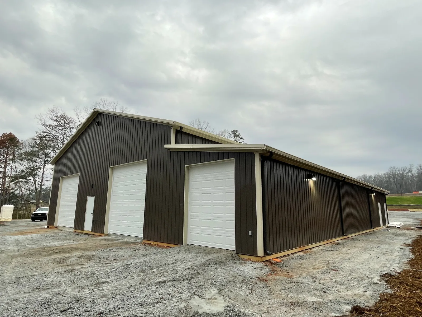 Hoover Building Systems team on a completed job site