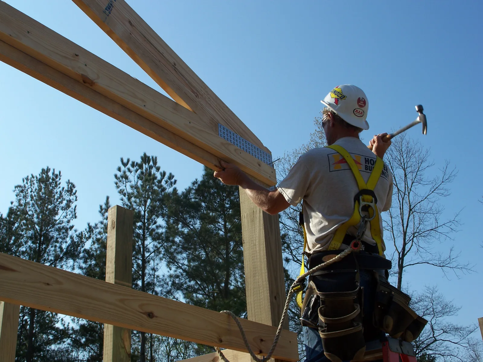 Engineered roof trusses being assembled in-house at Hoover Building Systems